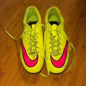 Nike Yellow and Pink Cleats Vibrant Athletic Design